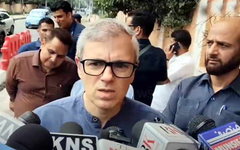 Omar Abdullah speaks at a press conference regarding climate activist's arrest