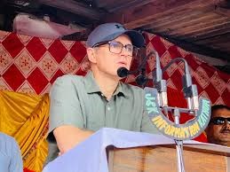 Omar Abdullah announcing land allocation for flood victims